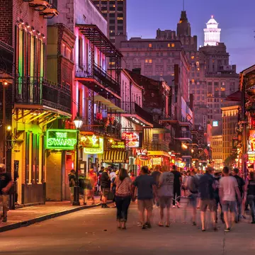 New Orleans, Louisiana - June 16, 2019:  Crowds of people party and walk along the French Quarter bars and restaurants on Bourbon Street New Orleans Louisiana USA, License Type: media, Download Time: 2025-12-05T21:19:29.000Z, User: rhylton_redventures, Editorial: true, purchase_order: 65050 - Digital Destinations and Articles, job: Lonely Planet, client: social, other: Rhianydd Hylton
