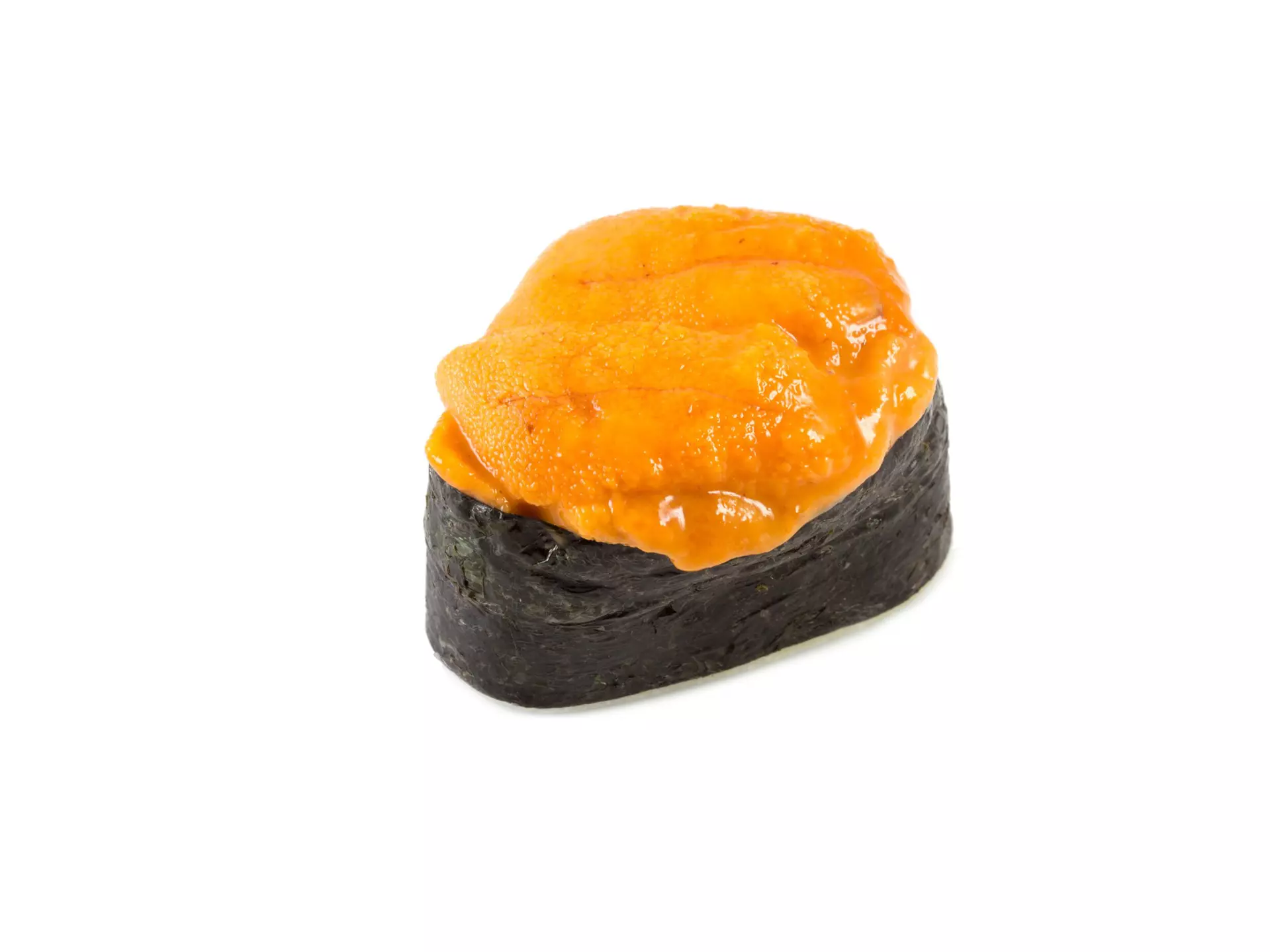 A hand holding Uni Gunkan at Sake no Hana. Orange sea urchin sits on a bed of rice wrapped in seaweed topped with fresh wasabi