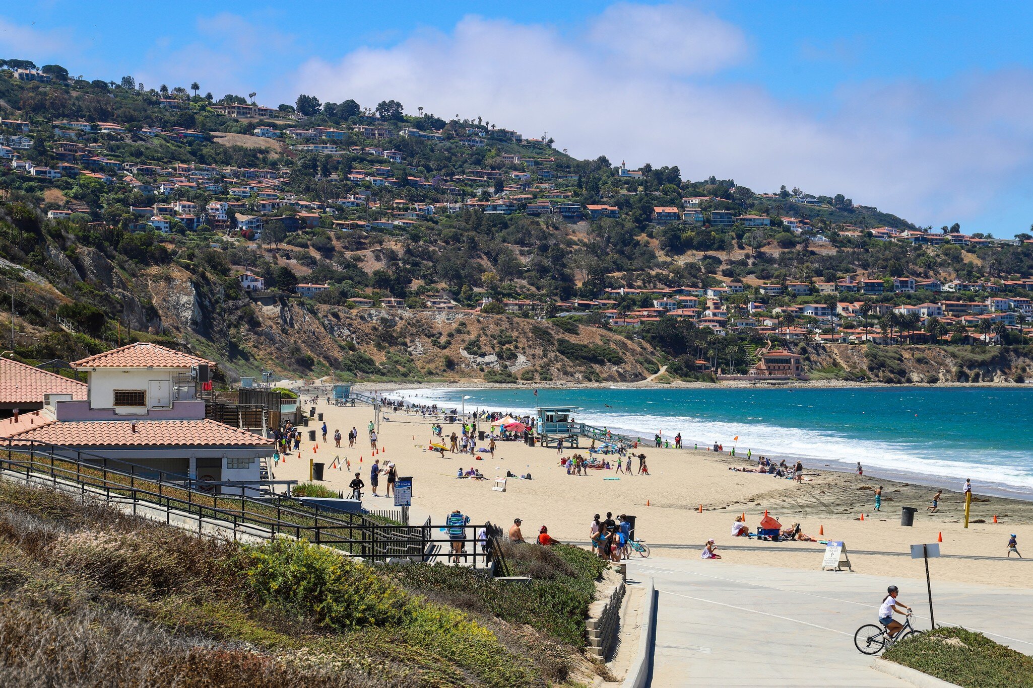 a beautiful summer landscape at Burnout Beach with blue ocean water, people relaxing in the sand, blue sky and clouds in Redondo Beach California USA, License Type: media, Download Time: 2026-08-05T17:13:47.000Z, User: LP_NZhan, Editorial: false, purchase_order: 65050 - Digital Destinations and Articles, job: App Content, client: Lonely Planet, other: Nadine Zhan 