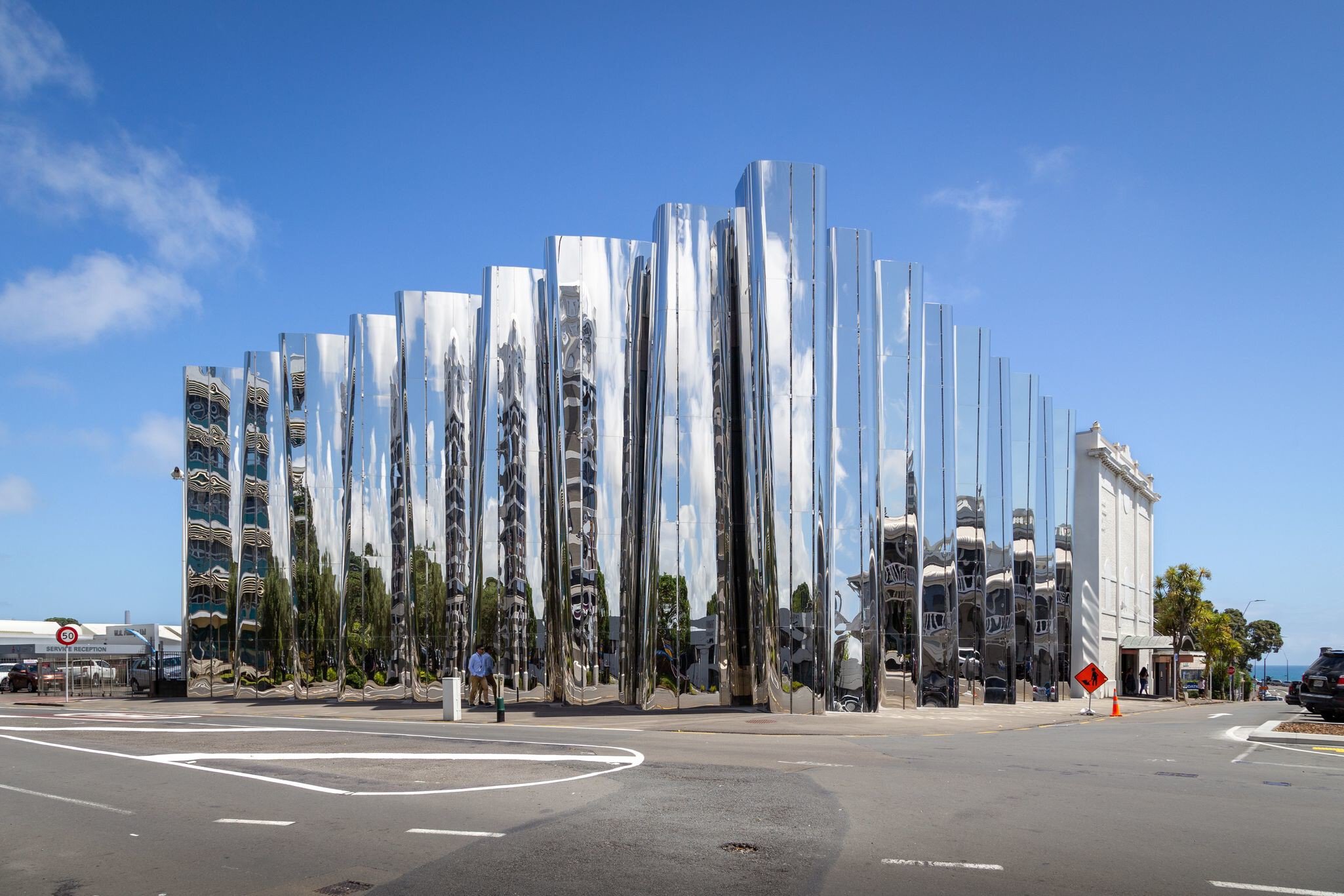 New Plymouth, New Zealand – November 19, 2019: Reflective stainless steel facade of the Len Lye Centre (Govett-Brewster Art Gallery) in New Plymouth, New Zealand.