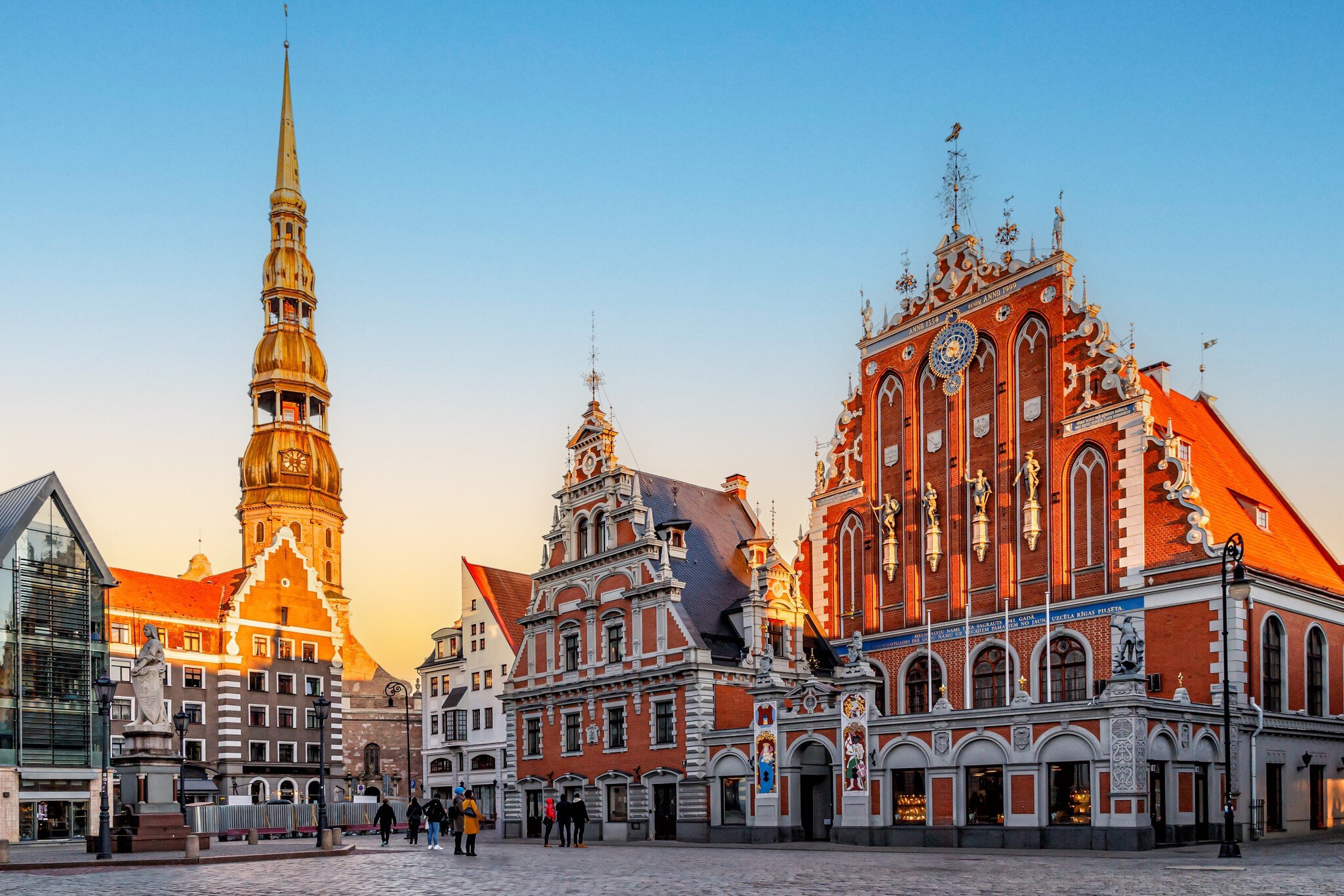 Riga,Latvia. October 11, 2016: City Hall Square with House of the Blackheads and Saint Peter church in the Old Town of Riga Historic architecture, creating a picturesque urban scene., License Type: media, Download Time: 2026-01-18T23:00:43.000Z, User: robinbarton170, Editorial: true, purchase_order: 56500 - T&R or Kids, job: Global Publishing-WIP, client: The Travel Book 5, other: Robin Barton
