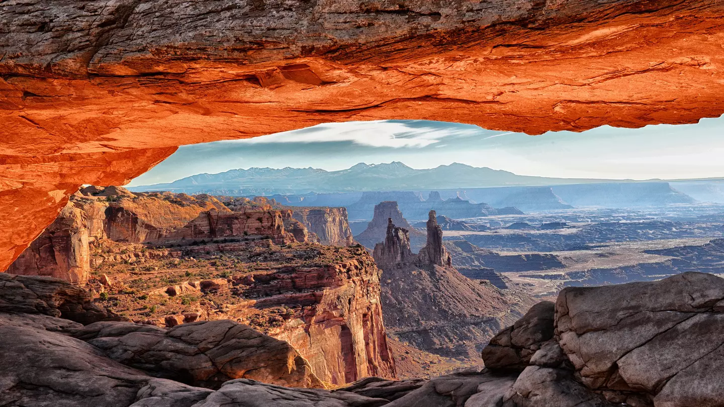Inside Mesa Arch at Sunrise
Awe Majestic Purity Tranquil Scene Nature Travel Destinations Horizontal Outdoors Natural Phenomenon USA International Landmark Light - Natural Phenomenon Land Feature Rock - Object Natural Arch Western USA Utah Canyonlands ...