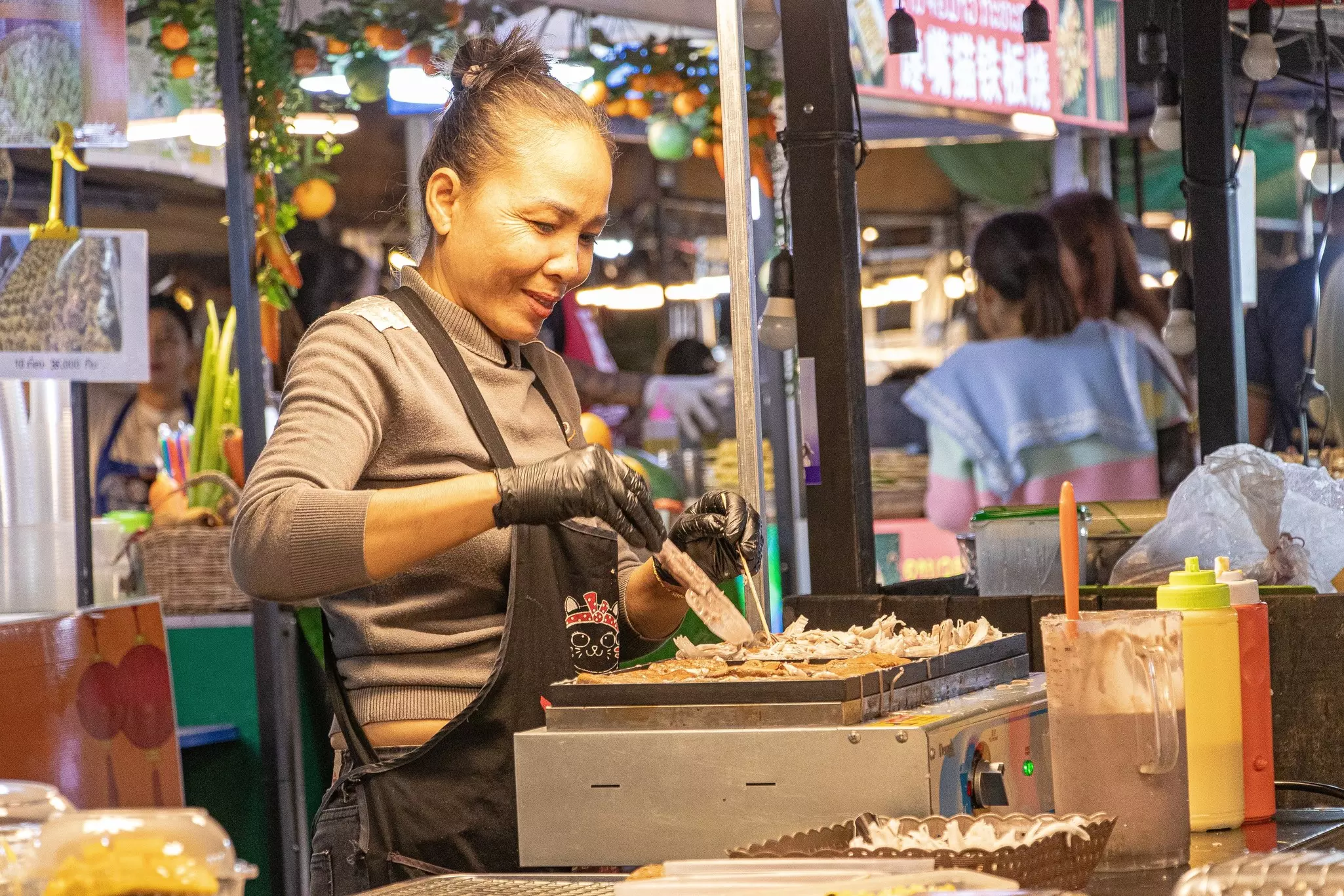 women selling local food in the farmers market in Vientiane Laos