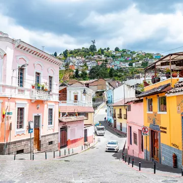 From exploring historic churches to visiting vibrant markets and stunning viewpoints in Ecuador's capital city. jon chica parada/Getty Images
