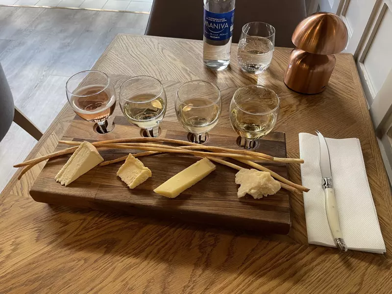 A flight of cheese paired with wines 