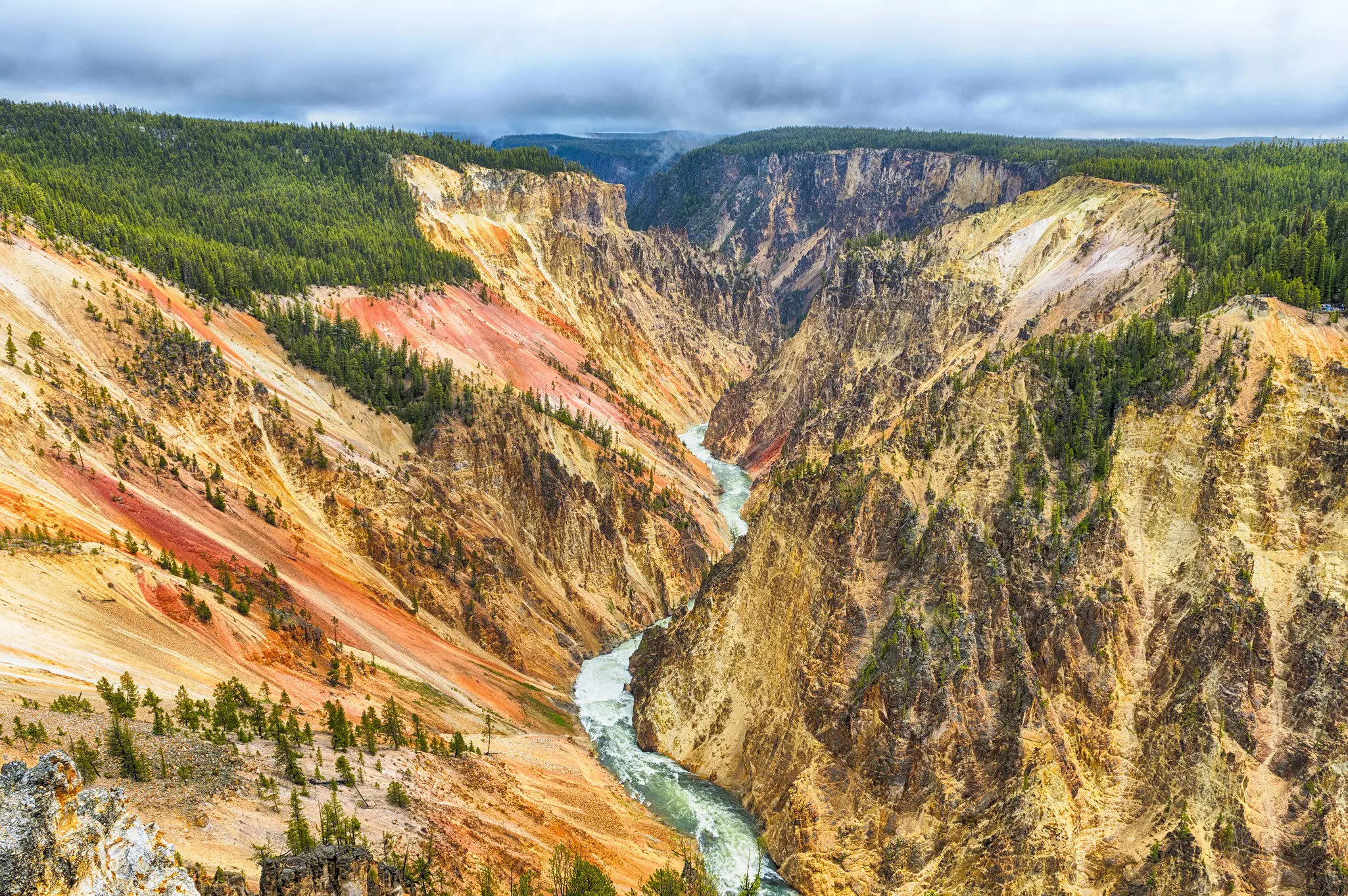 A river runs through a picturesque valley