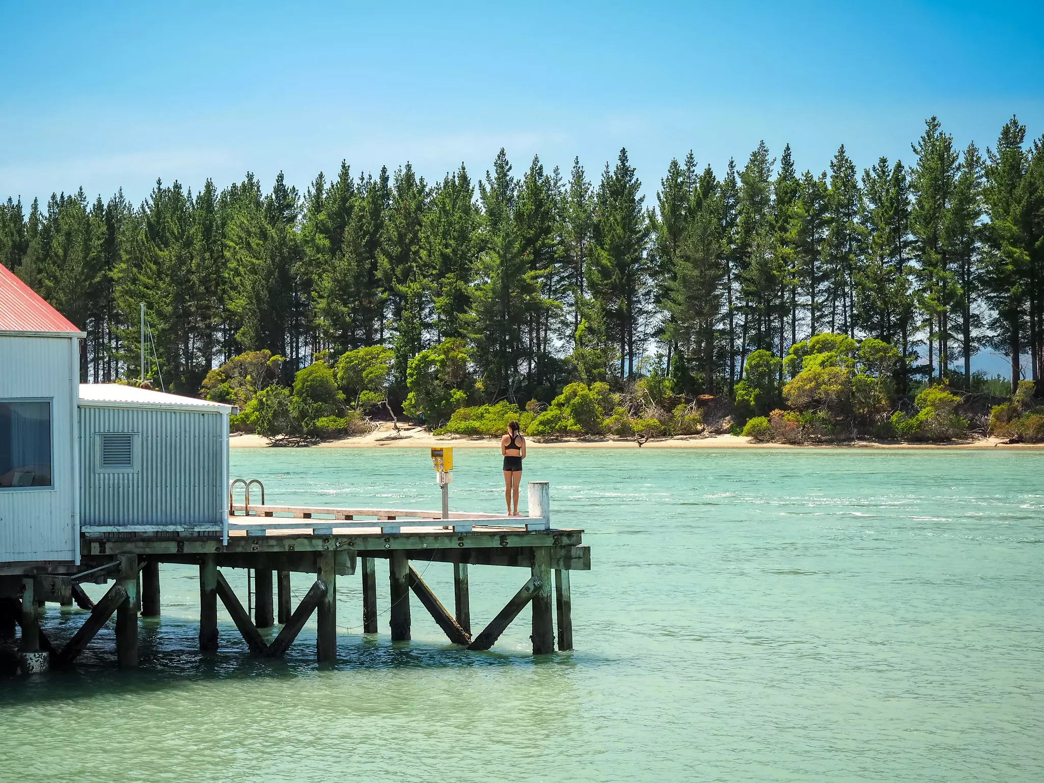 A girl at the Māpua Wharf in New Zealand.
