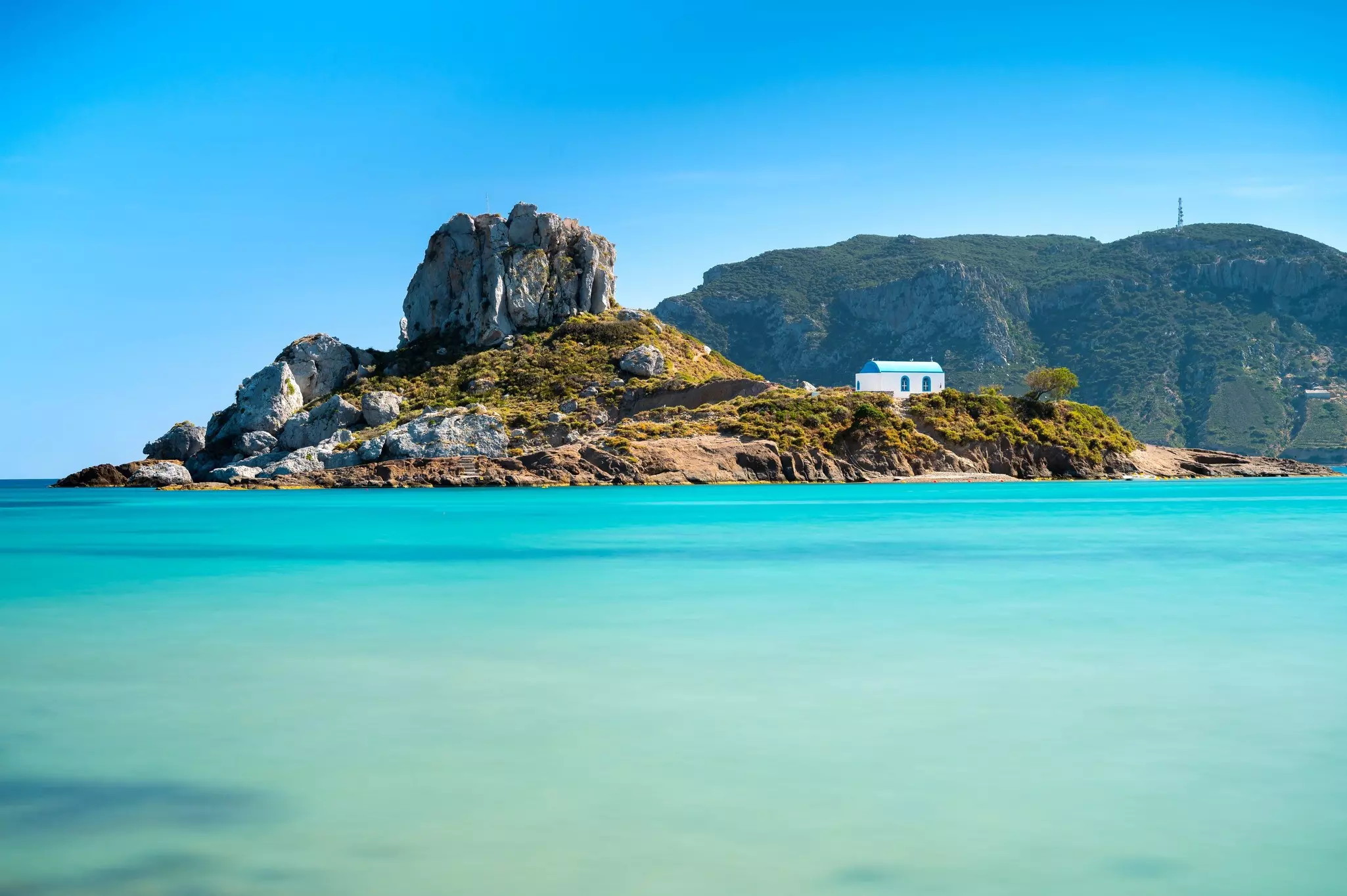 View on small island of Kastri near Kefalos town. Agios Stefanos beach in Kos island, Greece., License Type: media, Download Time: 2025-09-07T17:00:04.000Z, User: bhealy950, Editorial: false, purchase_order: 65050 - Digital Destinations and Articles, job: Lonely Planet Online Editorial, client: Best things to do in Kos, other: Brian Healy