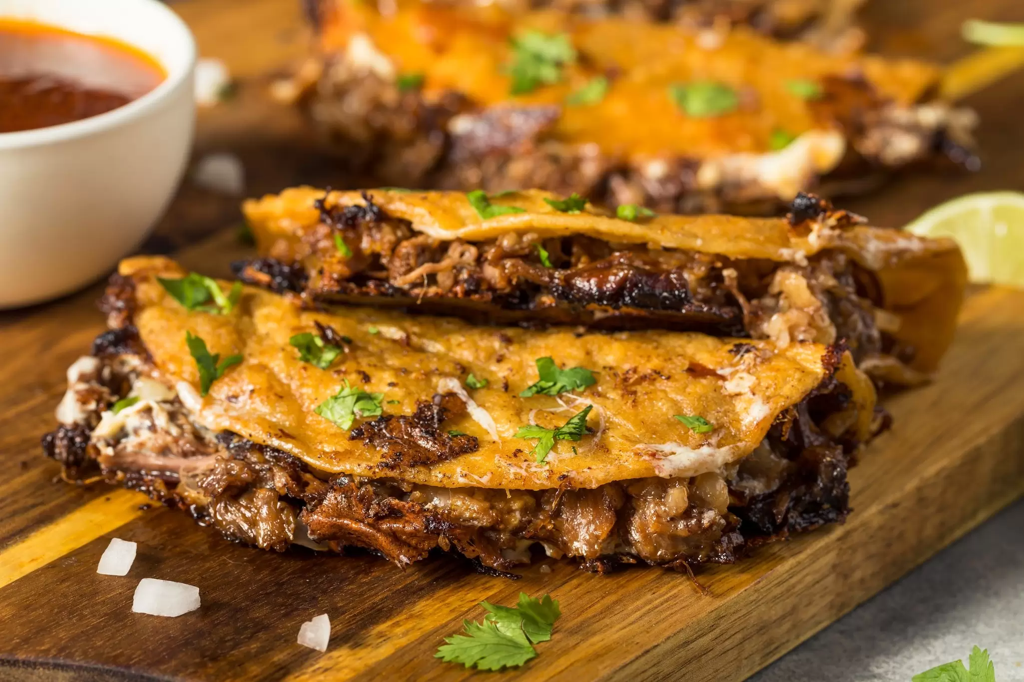 Homemade birria tacos. Brent Hofacker/Shutterstock