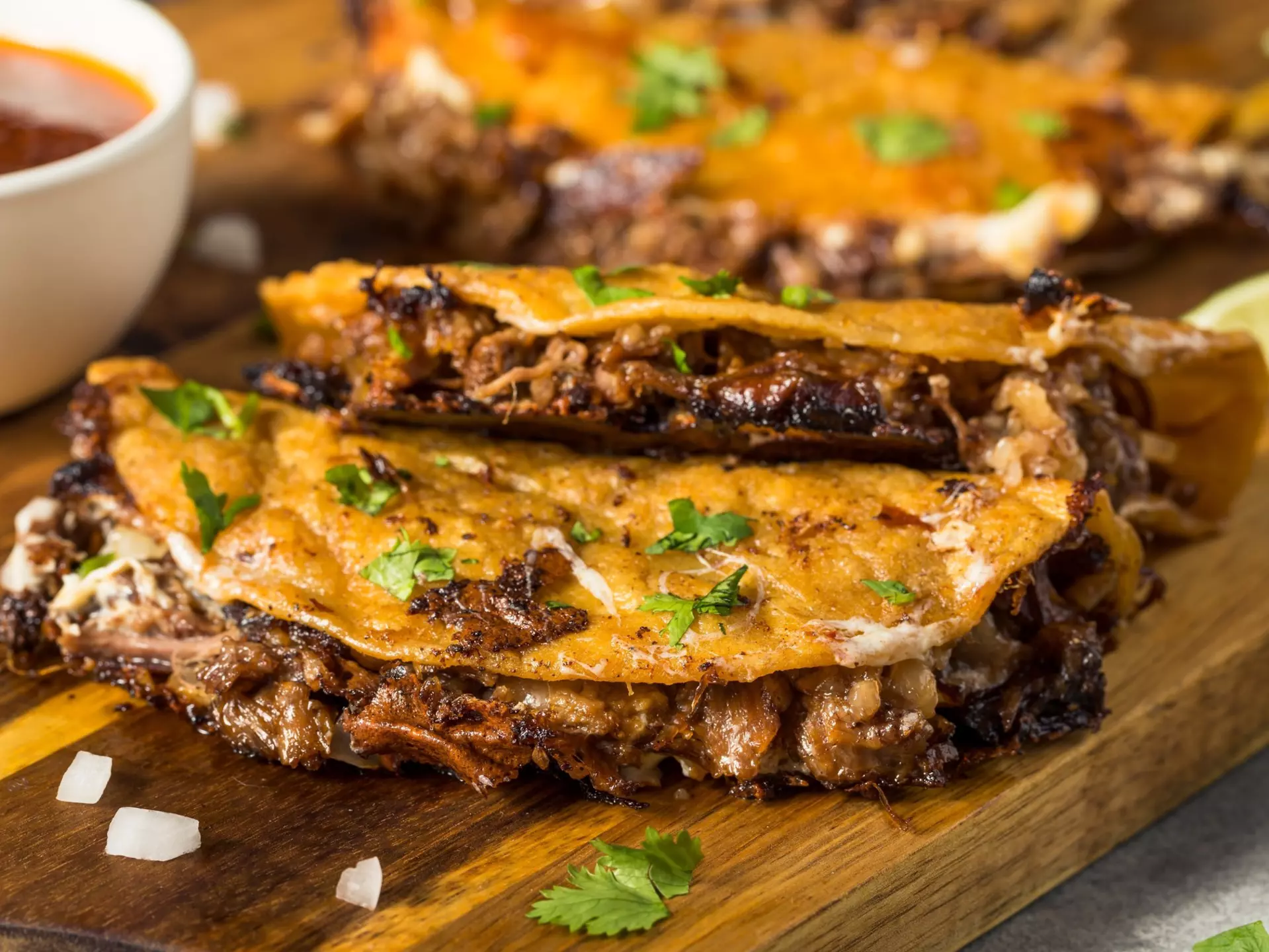 Homemade birria tacos. Brent Hofacker/Shutterstock