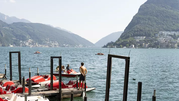 Paddle boats in Lugano.