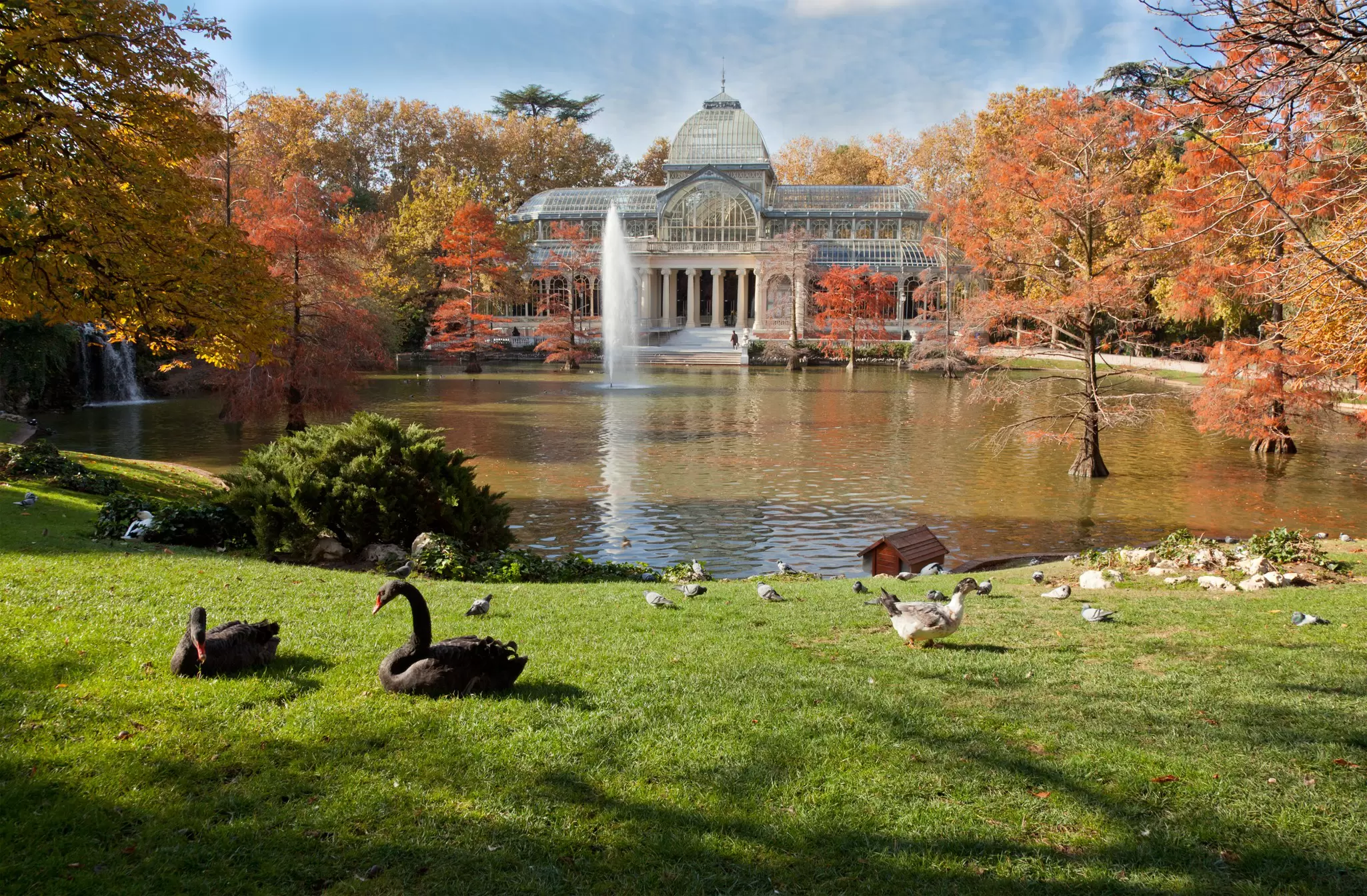 The glass Crystal Palace in Madrid's Retiro Park in autumn