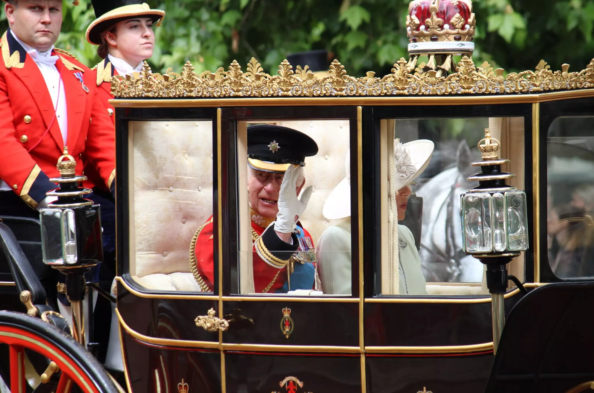 King Charles and Queen Camilla in a carriage during the Trooping the Color parade, London, England.