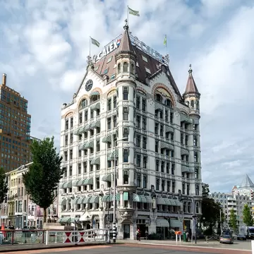 Exterior view of the Witte Huis, a historic building, in Rotterdam on a sunny day.