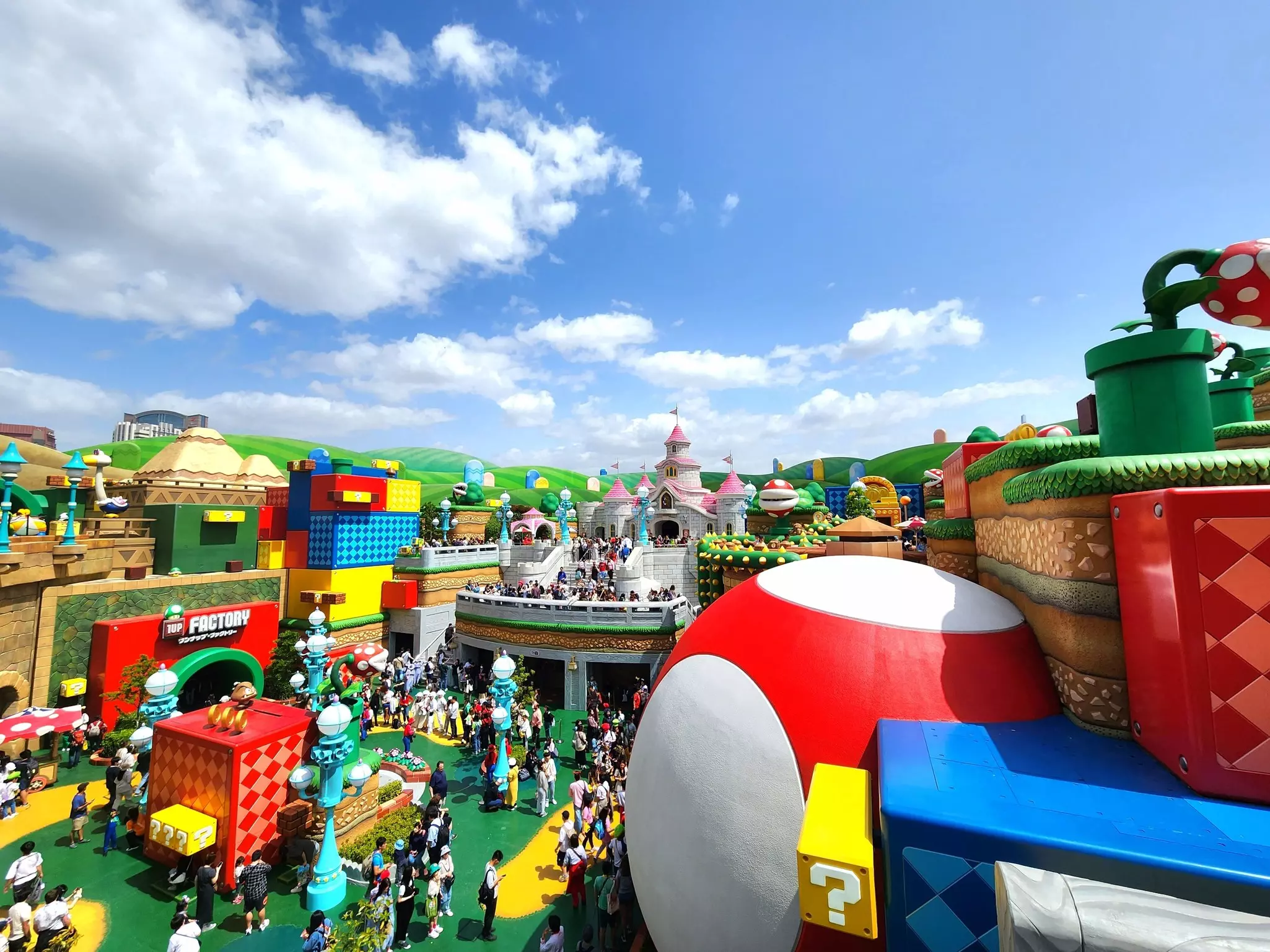 Overview of a colorful section of Super Nintendo World at Universal Studios Japan. 