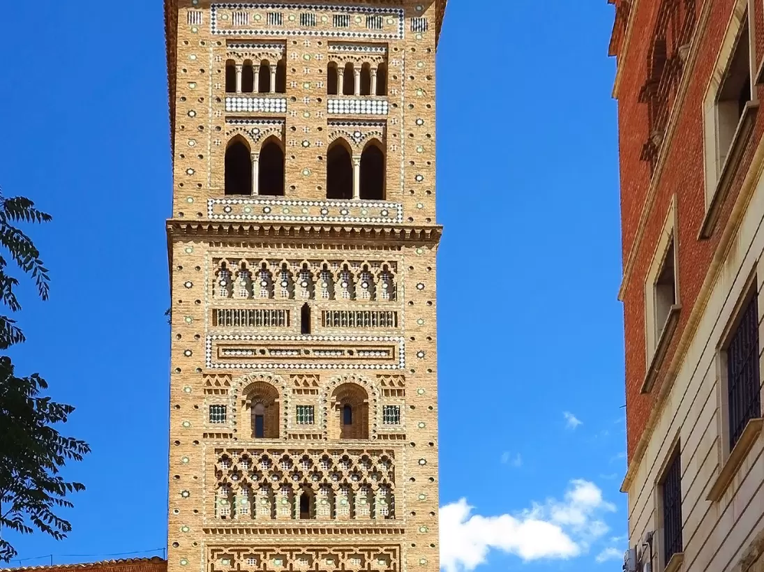 View of the Torre de San Martín on a sunny day in Teruel, Spain.