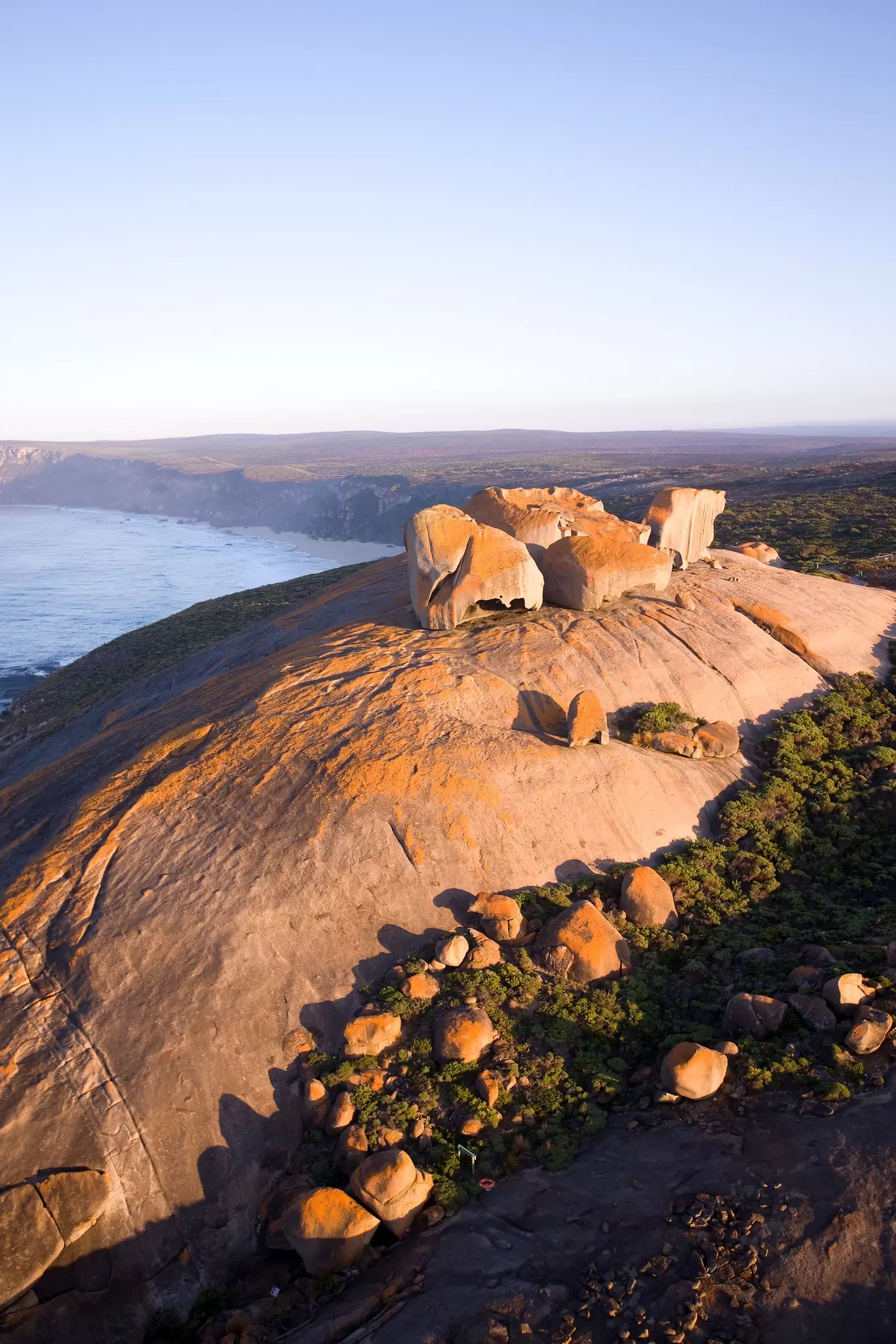 Large red rock formations overlooking the ocean