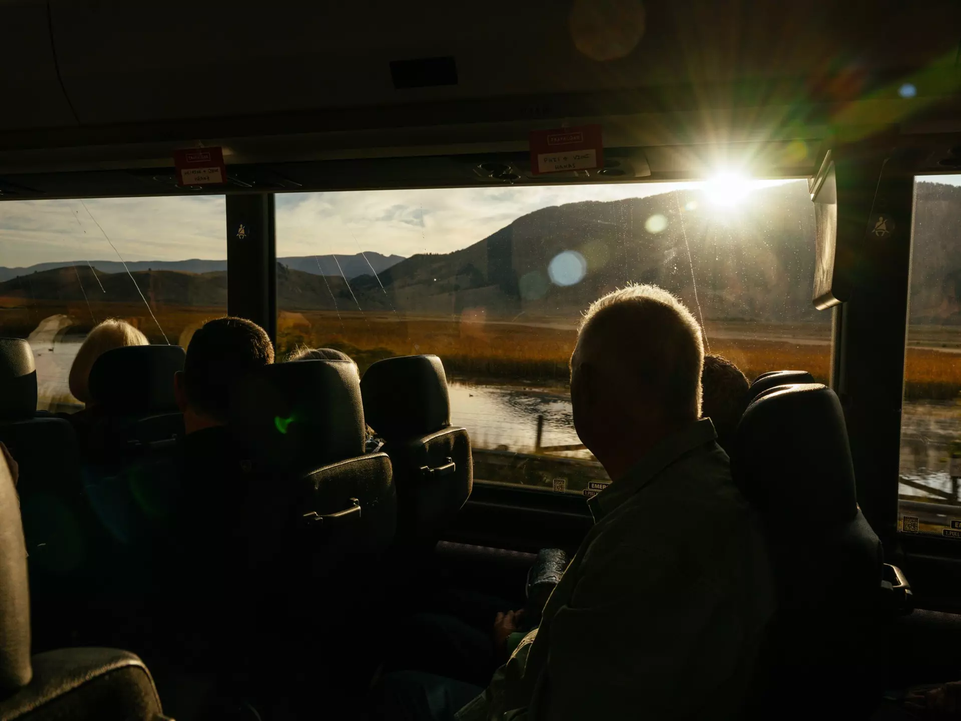 Tourists on a bus through Grand Teton National Park, Wyoming. September 2025.