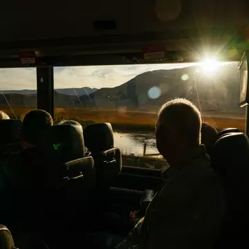 Tourists on a bus through Grand Teton National Park, Wyoming. September 2025.