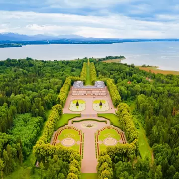 The Herrenchiemsee Palace complex comprises stately royal buildings on Herreninsel, the largest island in the Chiemsee Lake.