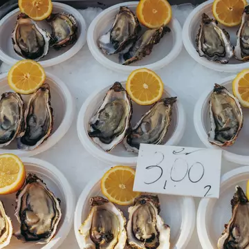 Oyster for sale on La Pescheria fish market in Catania city on the island of Sicily, Italy, License Type: media, Download Time: 2025-05-29T19:38:38.000Z, User: rhylton_redventures, Editorial: false, purchase_order: 65050 - Digital Destinations and Articles, job: Lonely Planet, client: wip, other: Rhianydd Hylton