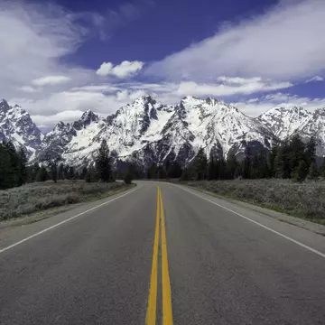 Cruise toward that Rocky Mountain ridge with the perfect soundtrack. Jeff R Clow / Getty Images