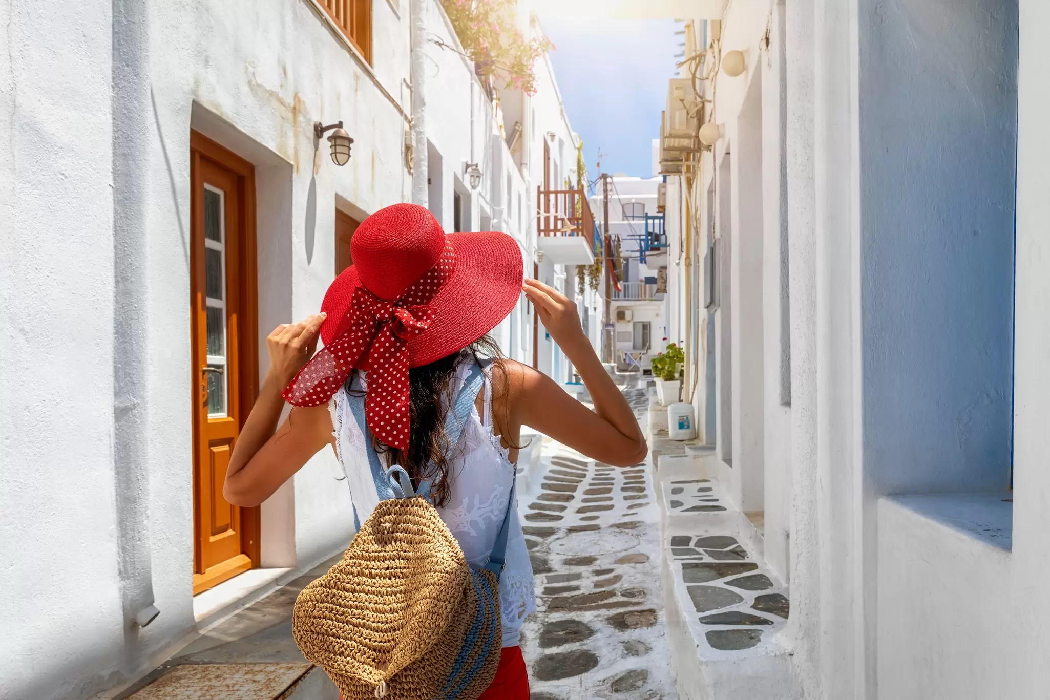 A narrow whitewashed alleyway in Hora, Mykonos, Greece