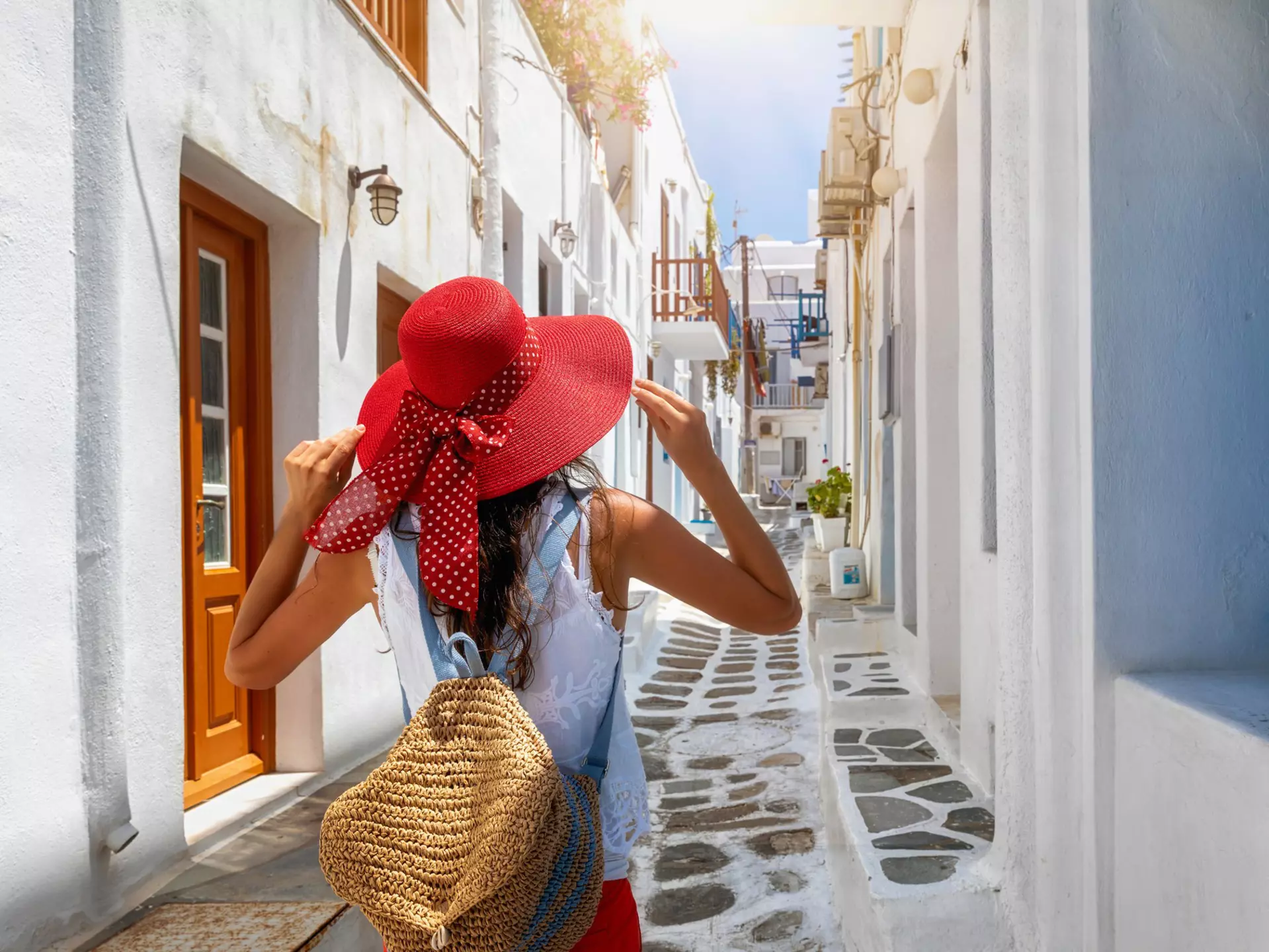 Wandering the narrow streets of Hora is a delightful way to spend the afternoon
1161650046
Mykonos, Hora, alleyway, woman