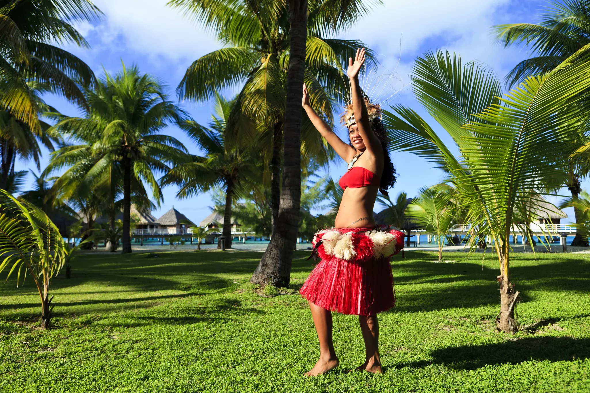 Local woman dancing amidst palm trees, Bora Bora
182885062
"Beautiful, 20-25 Years, Beach, Beauty In Nature, Blue, Bora Bora, Bungalow, Costume, Dancer, Dancing, Exoticism, Female, French Polynesia, Motion, Multi Colored, Red, Sand, Sarong, Sea, Stage Costume, Stereotypical, Tahiti, Tan, Tourism, Traditional Clothing, Travel, Travel Backgrounds, Travel Locations, Tropical Climate, Tropical Music", Water