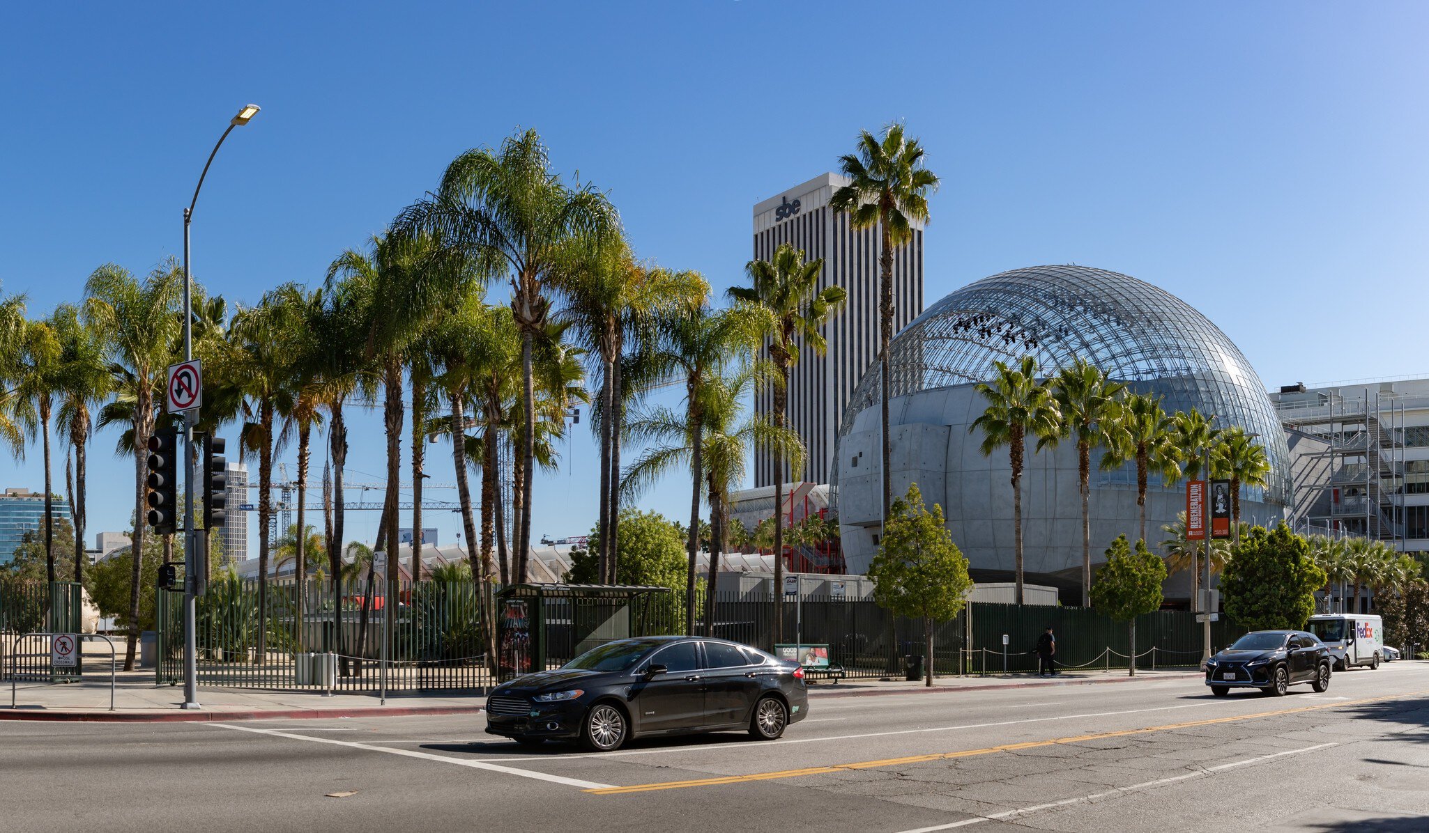 Los Angeles, United States - November, 2022: A picture of the large dome of the Academy Museum of Motion Pictures and the nearby palm trees.  License Type: media  Download Time: 2023-10-05T13:36:23.000Z  User: nic.dhoedt_lonelyplanet  Is Editorial: Yes  purchase_order:   
