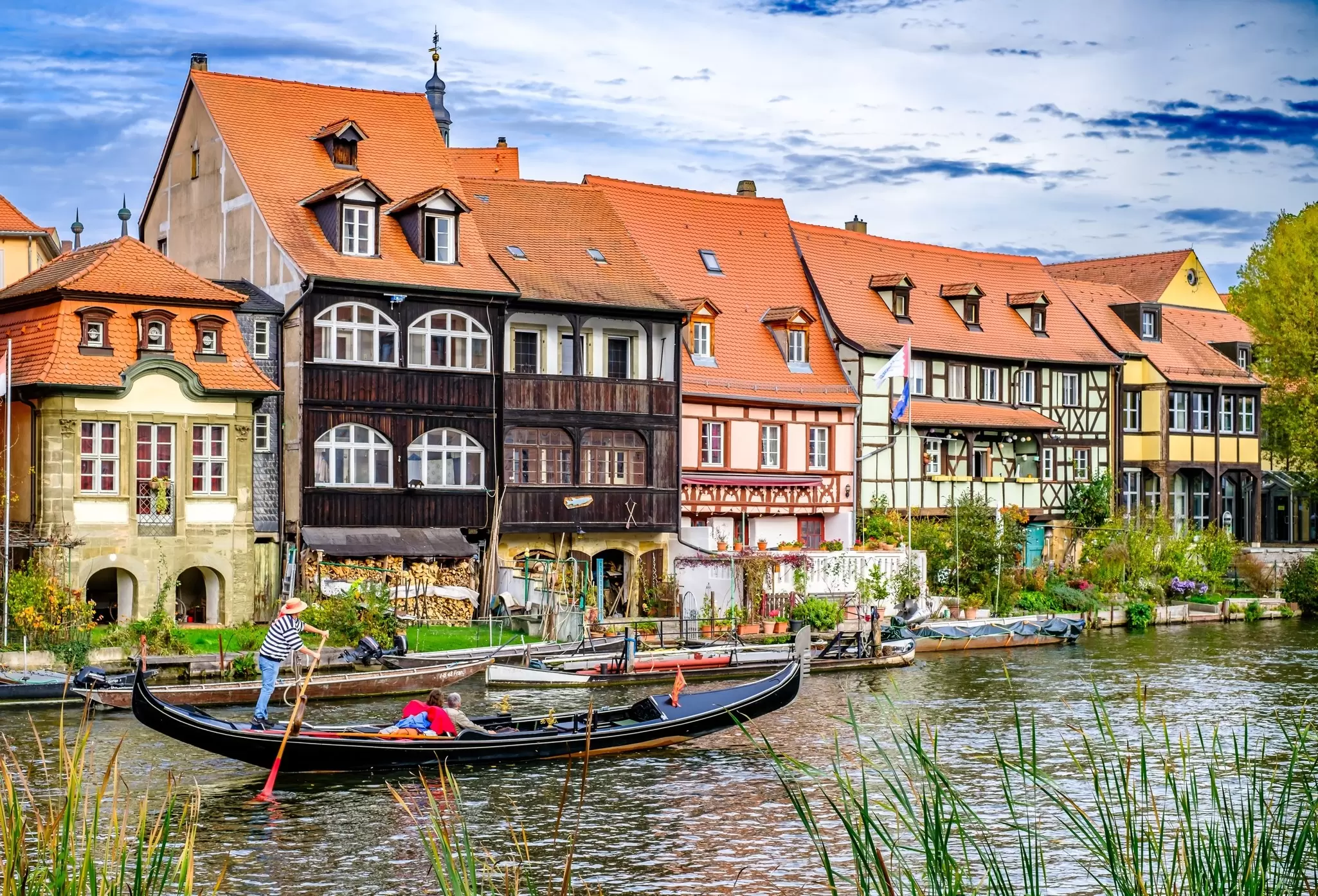 Bamberg, Germany - October 23: historic buildings and a gondola at the famous old town of Bamberg on October 23, 2022, License Type: media, Download Time: 2026-02-11T12:15:41.000Z, User: robinbarton170, Editorial: true, purchase_order: 56500 - T&R or Kids, job: Global Publishing-WIP, client: The Travel Book 5, other: Robin Barton