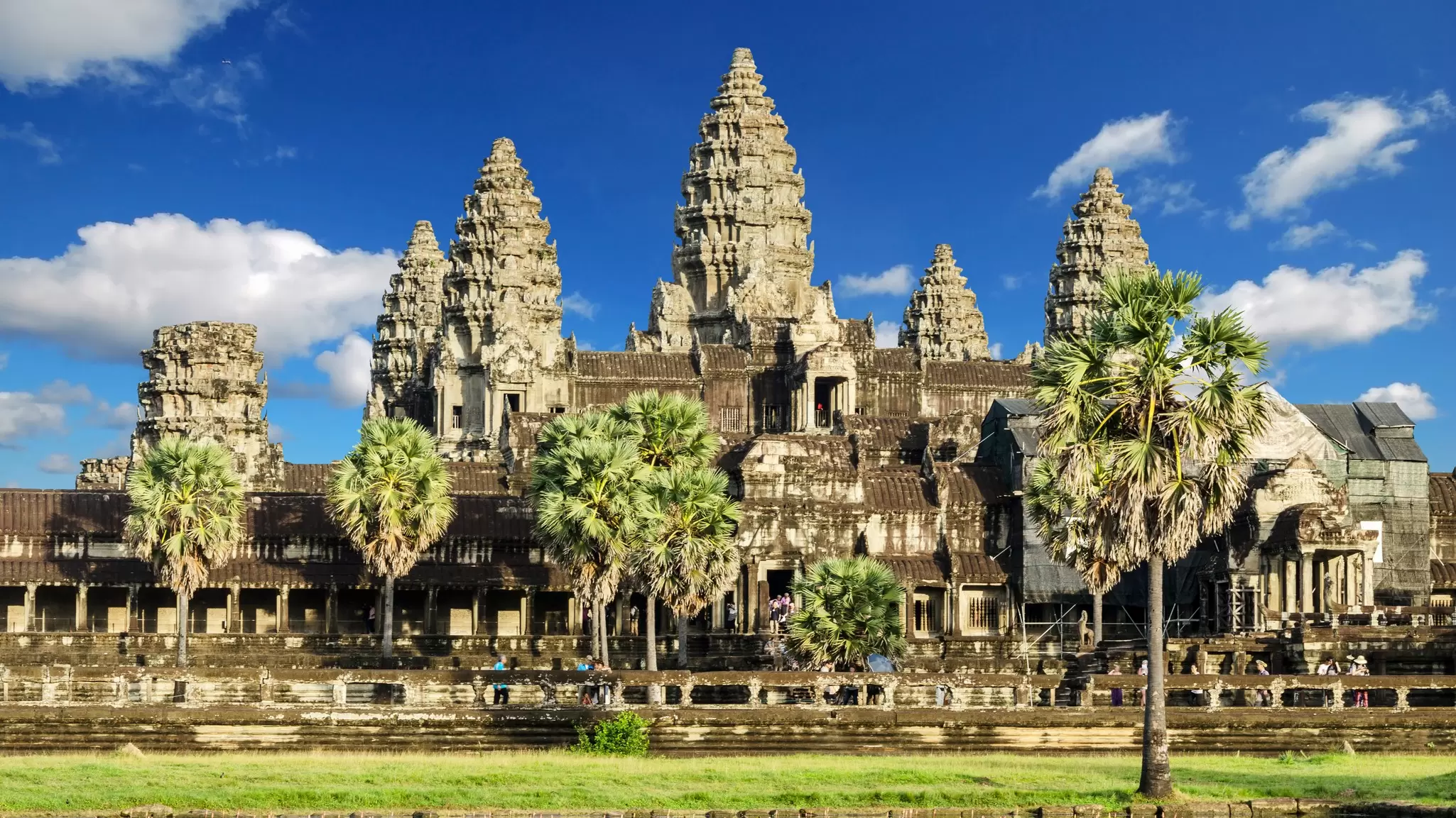 The towers of Angkor Wat reflected in the temple moat, Cambodia.