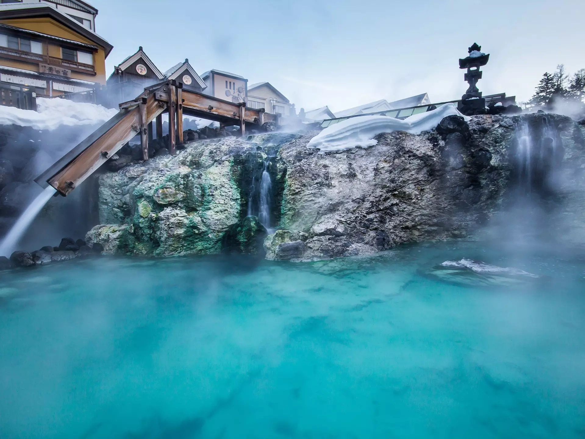 Hot water gushes down wooden channels at Yubatake, in Kusatsu Onsen © dekitateyo / Shutterstock