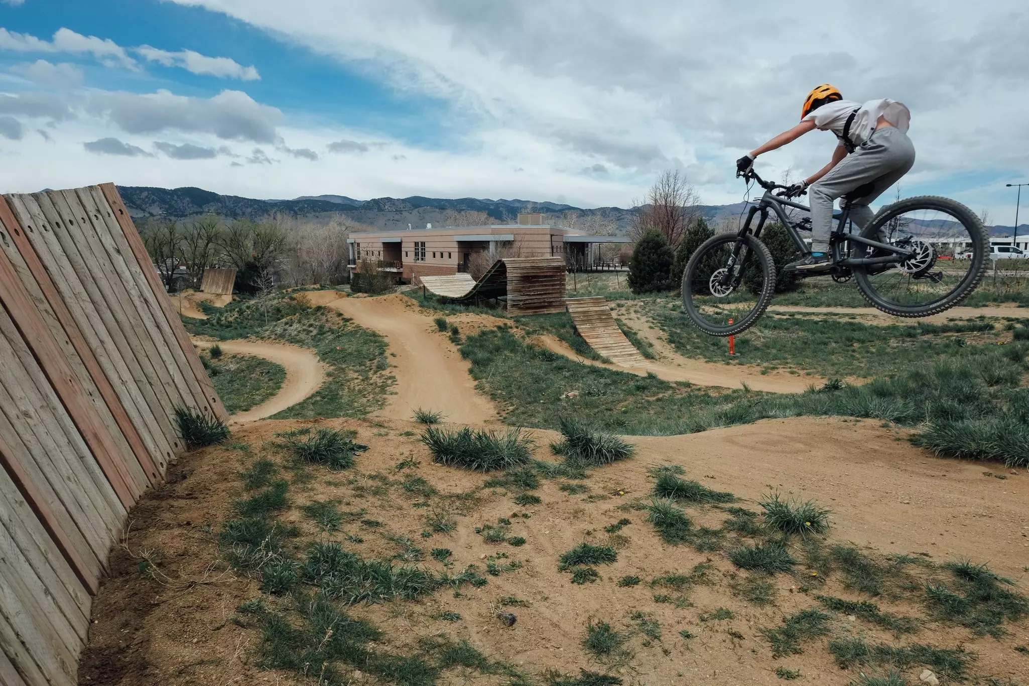 A mountain biker catches big air at Valmont Bike Park.