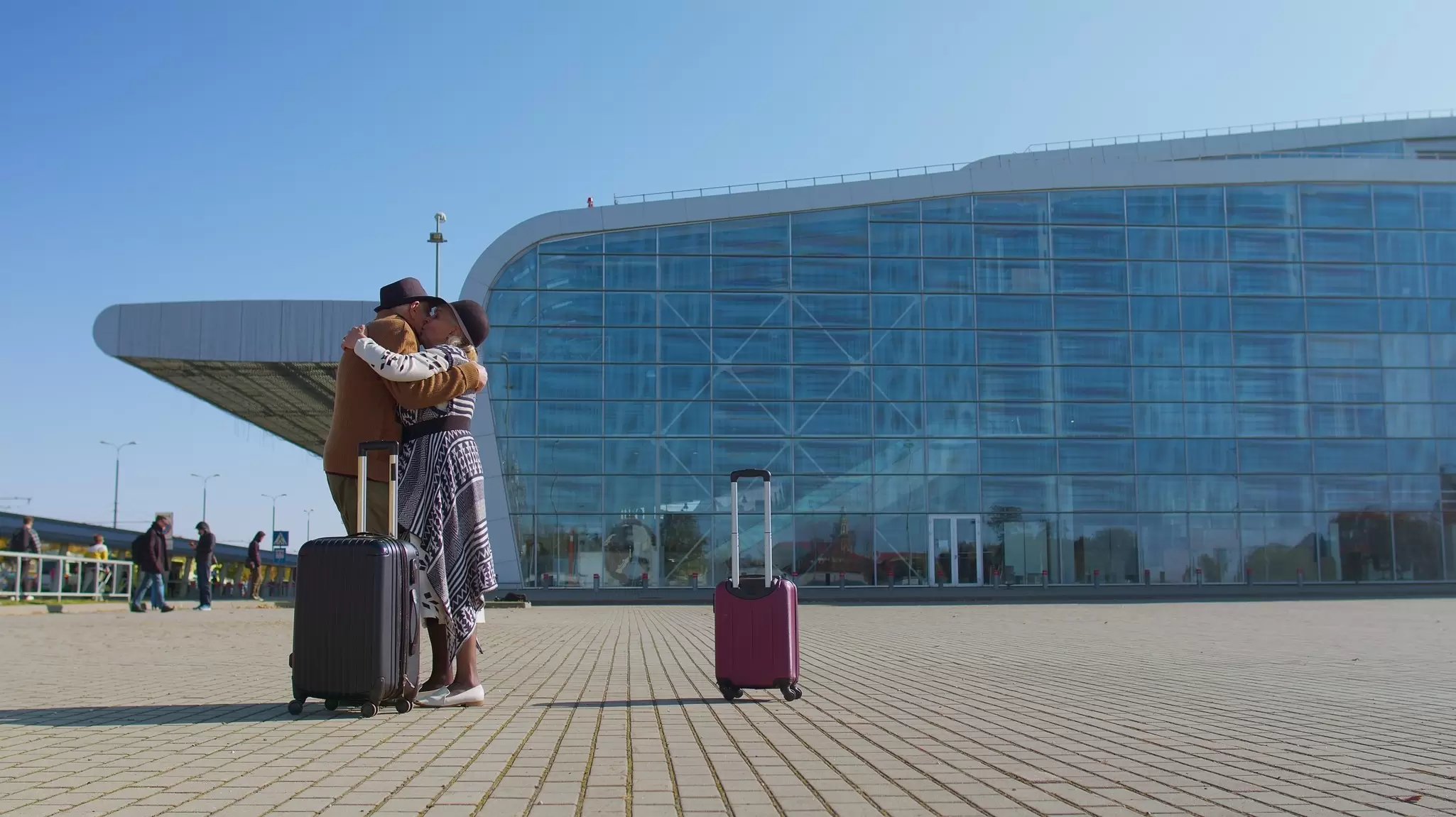 Senior old husband meet wife retirees tourists reunion near airport terminal. Long-awaited meeting. Grandmother grandfather hugging meeting after long flight vacations, trip work, coronavirus lockdown, License Type: media, Download Time: 2026-09-14T17:07:19.000Z, User: Sarahstocking, Editorial: false, purchase_order: 65050 - Digital Destinations and Articles, job: Digital, client: Meet your lover at the gate, other: Sarah Stocking