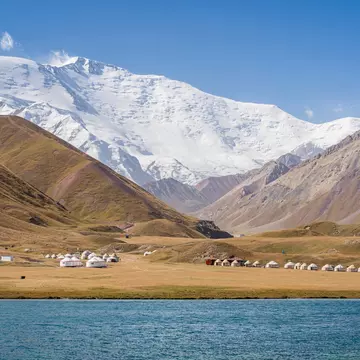 Tulpar Köl lake and Sary Mogul yurt camp in Kyrgyzstan. Cyrille Redor/Shutterstock