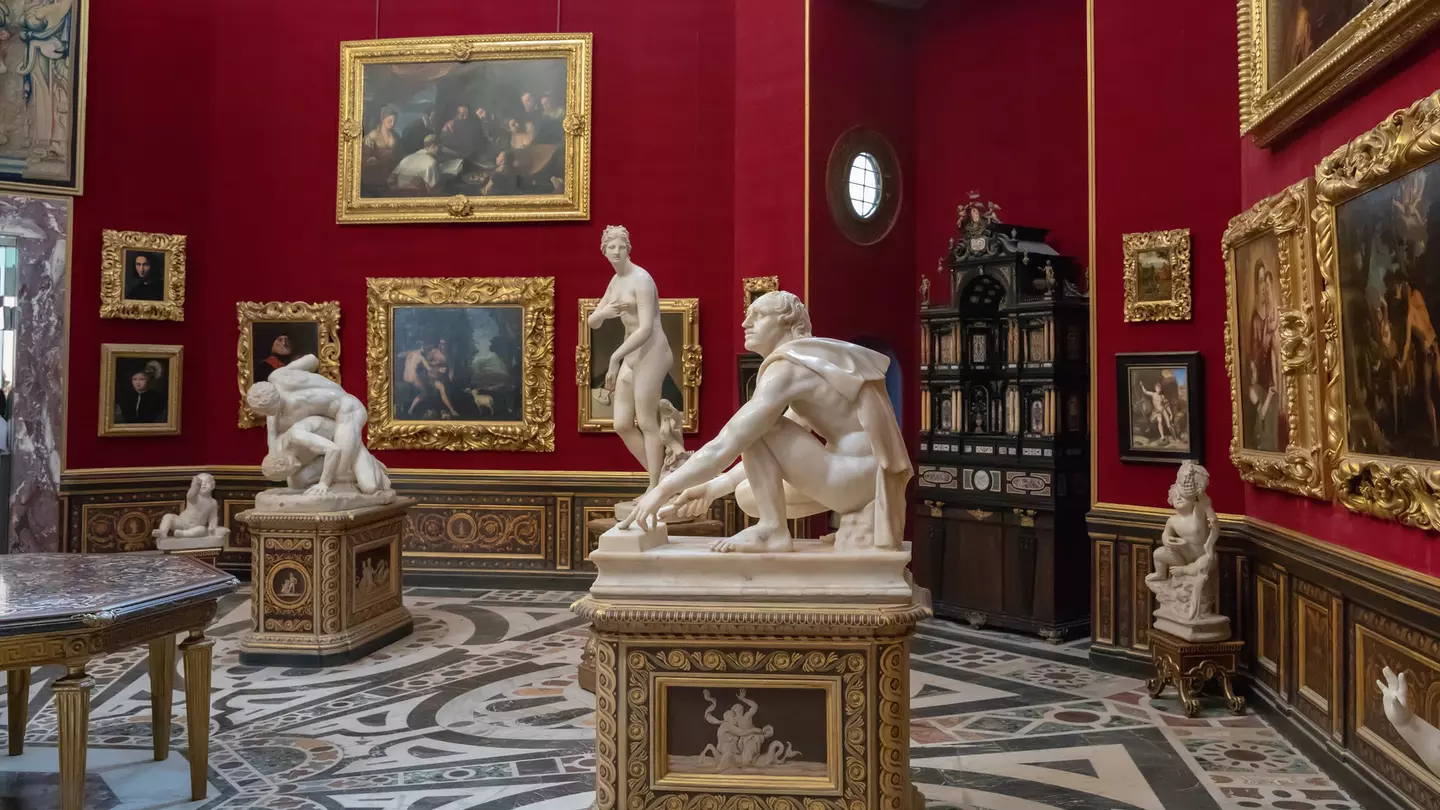 Statues inside the Tribuna degli Uffizi room at the Galleria degli Uffizi in Florence, Italy.
