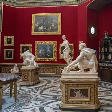 Statues inside the Tribuna degli Uffizi room at the Galleria degli Uffizi in Florence, Italy.