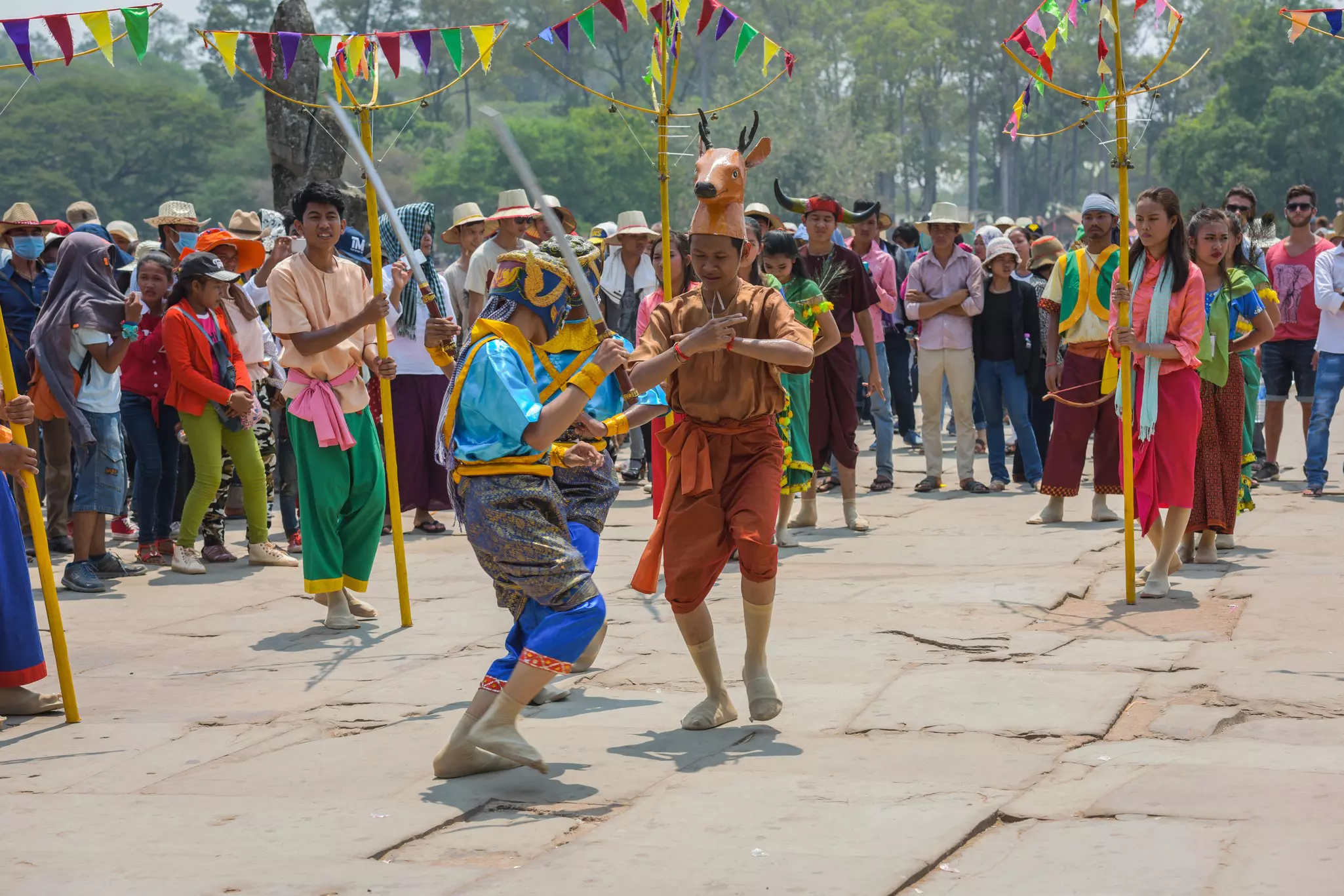 Performers doing a traditional Khmer dance at Angkor Wat in Cambodia during Khmer New Year.