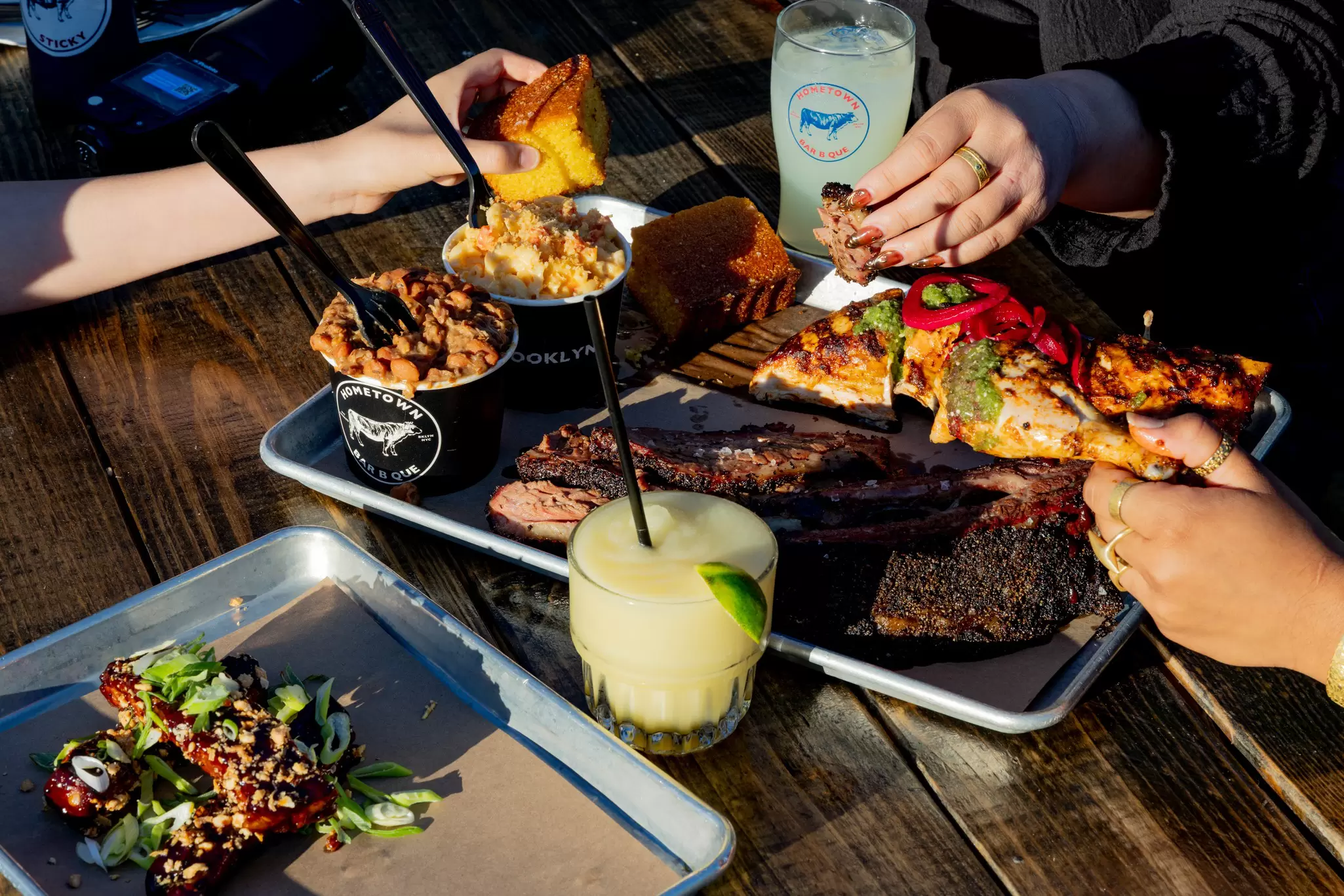 Contact: justin@hometownbarbque
Brooklyn, New York May 30th 2026-- Hometown Bar B Que Redhook, Beef Ribs, Piri piri chicken, mac & cheese, corn bread, korean ribs, texas style pinto beans, brisket , lemonade, frozen margarita
