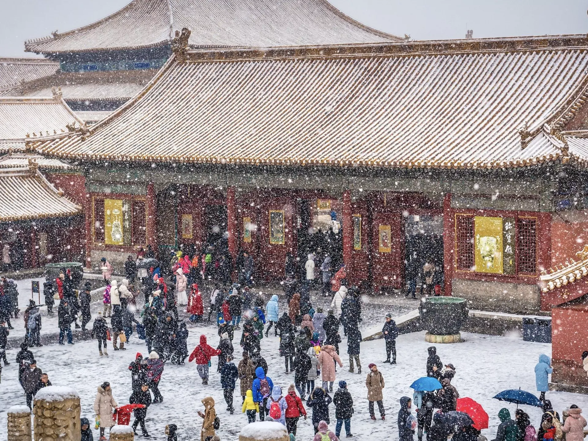 Snow falls on the Hall of Preserving Harmony, the Forbidden City, Beijing, China. Fotokon/Shutterstock