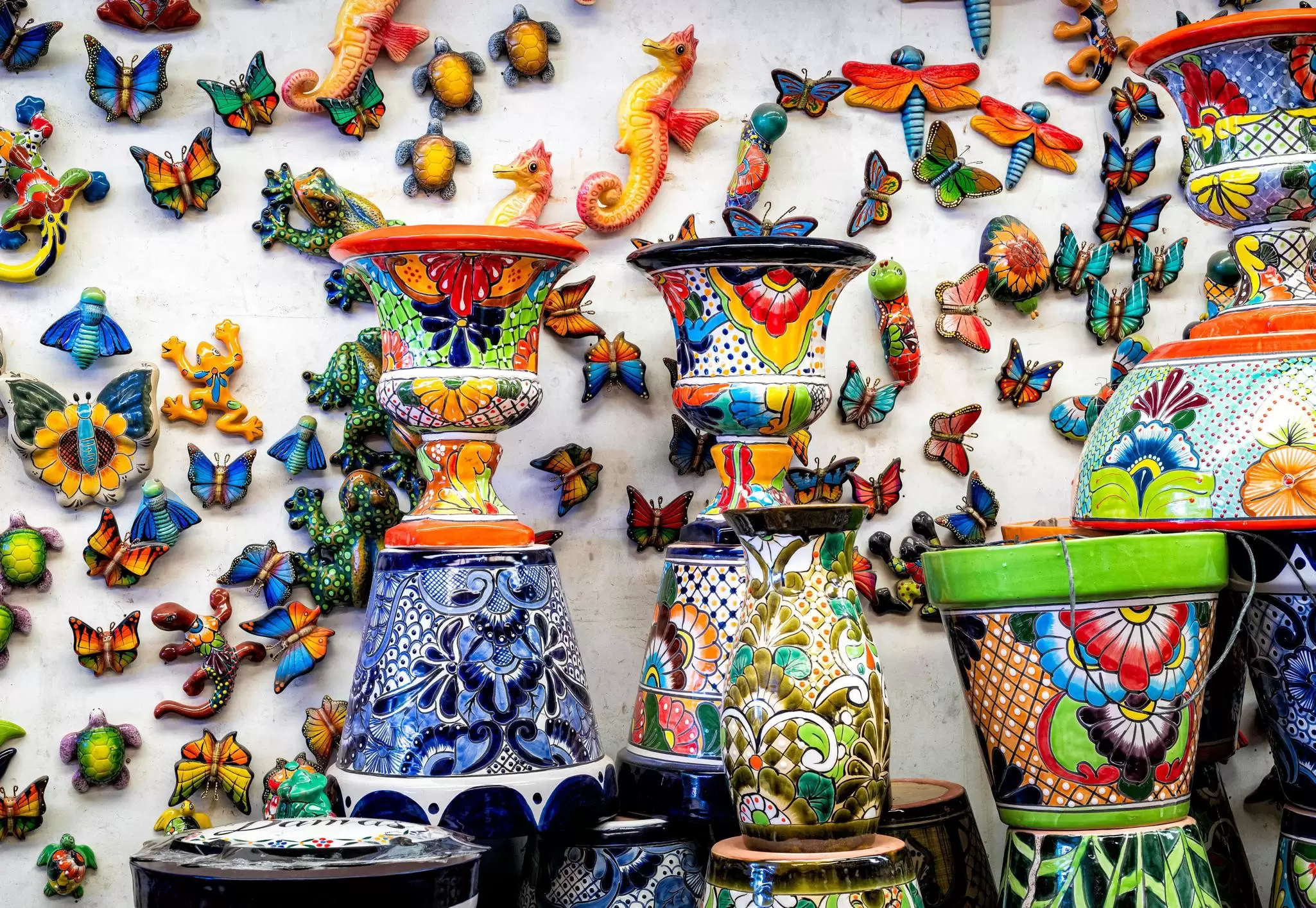  A wall covered with ceramic crafts for sale at a market in Guadalajara, Jalisco, Mexico.