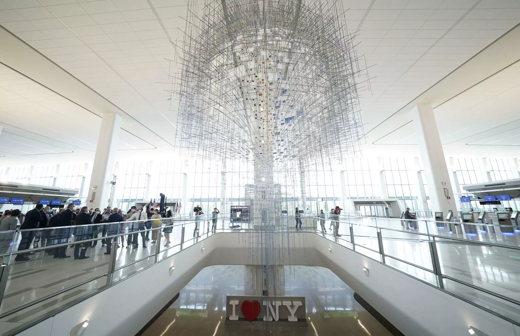 A bright, white renovated Terminal B at LaGuardia Airport in Queens, New York