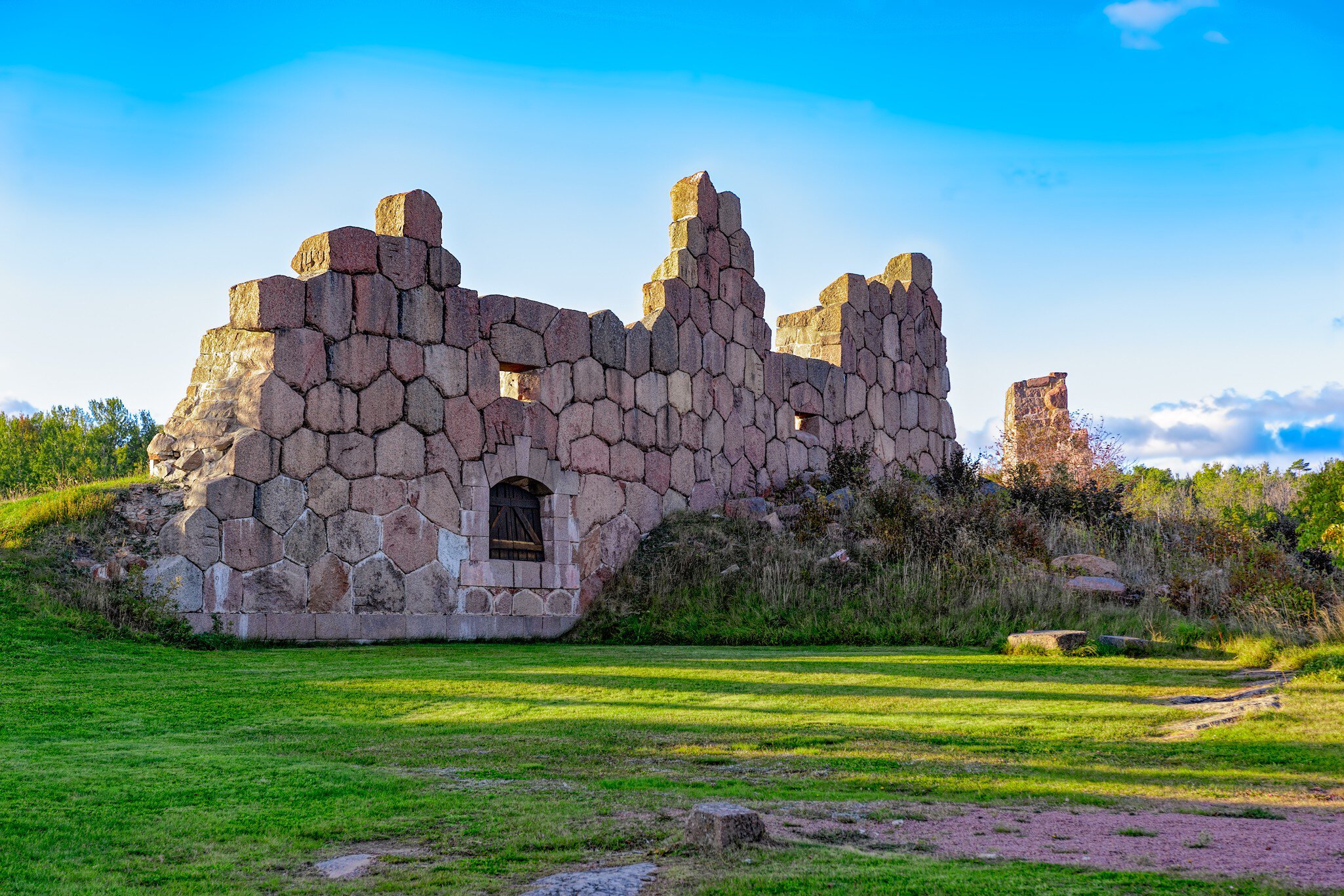 Ruins of the fortress Bomarsund (1832-1854). Remains of fortress destroed during the Crimean War in the field at autumn sunset; Shutterstock ID 508544278;