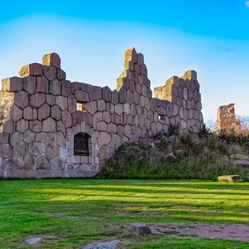 Ruins of the fortress Bomarsund (1832-1854). Remains of fortress destroed during the Crimean War in the field at autumn sunset; Shutterstock ID 508544278;