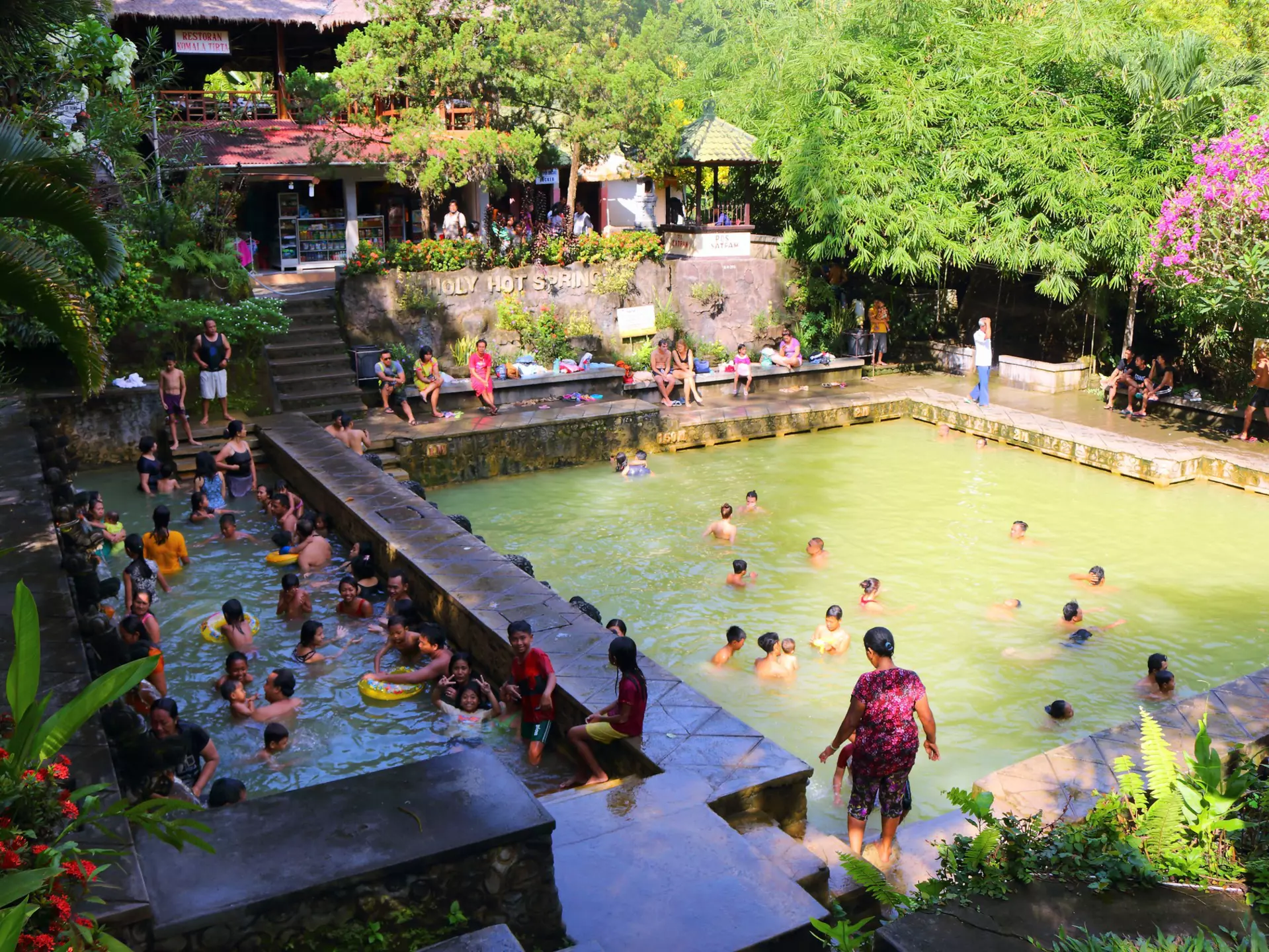 BANJAR, BALI, INDONESIA, ASIA - unidentified local people enjoy the hot springs in Banjar, Air Panas, Bali