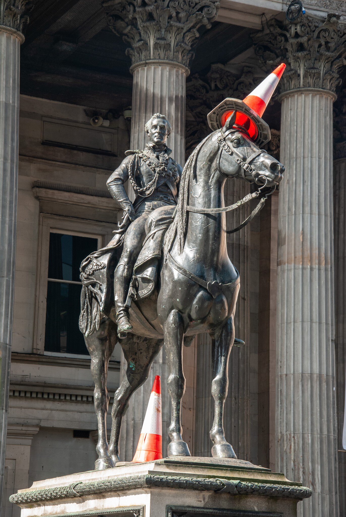 Glasgow, UK - September 4, 2019 - The iconic equestrian statue of Arthur Wellesley, 1st Duke of Wellington located outside the Gallery of Modern Art, Glasgow, Scotland, License Type: media, Download Time: 2025-08-05T19:31:11.000Z, User: katelyn.perry_lonelyplanet, Editorial: true, purchase_order: 65050 - Digital Destinations and Articles, job: wip, client: wip, other: Katelyn Perry