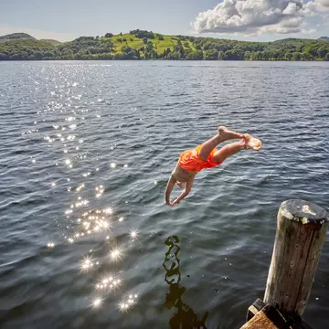 Take a summer dip in the Lake District, Cumbria. blue sky in my pocket/Getty Images
