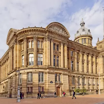 Birmingham Museum & Art Gallery's clock tower and museum entrance, left, beside the domed Council House on Victoria Square