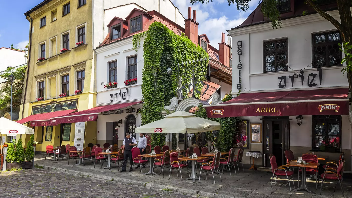 Jewish restaurant and cafe pub on a cobbled street in the Kazimierz district in Krakow, Poland